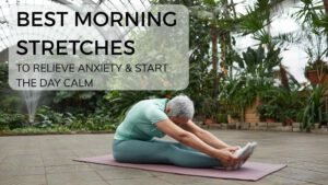 Woman seated cross-legged on a yoga mat in a softly lit morning room, gently stretching her neck with eyes closed—illustrating a calming morning stretch routine designed to reduce anxiety and promote mental clarity.