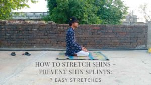 Person performing a kneeling shin stretch on a yoga mat, sitting back on their heels with toes pointed behind them—demonstrating an effective stretch for the anterior tibialis to prevent shin splints and improve flexibility.