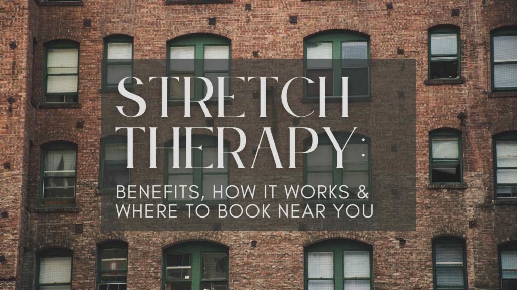 Stretch therapist guiding a client through a leg stretch on a professional table in a wellness studio, illustrating hands-on stretch therapy for improved flexibility, posture, and pain relief.